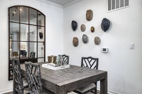Orlando apartment for rent - A dining room with a wooden table and chairs.