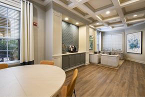 Orlando apartment for rent - A dining room with a white table and chairs.