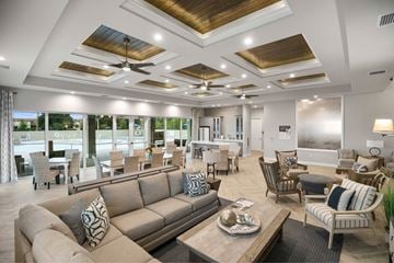 Fort Myers apartment for rent - A living room with a large couch and a coffee table.
