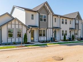 Madison apartment for rent - A row of houses with a clear blue sky above them.