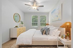 Johns Island apartment for rent - Furnished apartment bedroom with large windows inside homes at Stono Oaks