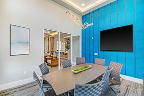 Palm Bay apartment for rent - A conference room with a long table and chairs.