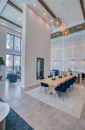Myrtle Beach apartment for rent - A dining room with a long table and chairs.