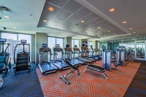 Atlanta apartment for rent - A gym with treadmills, exercise bikes and other equipment.