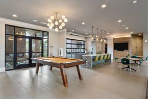 Nashville apartment for rent - Community Billiards Room with Bar Area, Tables, Seating, and Large