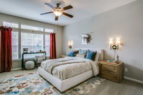 Houston apartment for rent - The Gael - bedroom with huge bright windows with comfortable bed