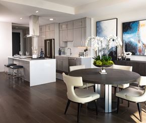 Frisco apartment for rent - A modern kitchen with a dining table set for four.