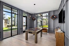 Summerville apartment for rent - A room with a pool table and a chair.