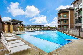Denton apartment for rent - A large swimming pool at the Vista at Razyor Ranch in Denton Texas