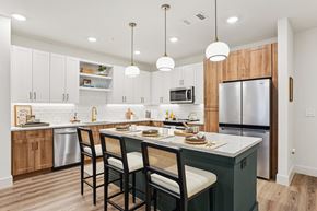 Irving apartment for rent - A kitchen with a dining table and chairs.