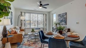 Pittsburgh apartment for rent - A dining room with a table set for six inside a model apartment at The Artisan at Robinson 