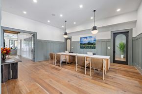Summerville apartment for rent - A dining room with a long table and chairs.