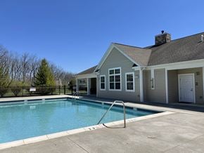 Northampton apartment for rent - Northampton, PA Garden-Style Apartments with In-Unit Washer and Dryer - Residences at Willow Ridge - A Pool Area with Metal Handrails, and Spacious Concrete Deck.