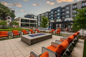 Dallas apartment for rent - An outdoor seating area with fire pit at The Academic in Dallas Texas