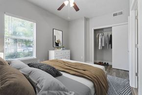 Mckinney apartment for rent - a white bedroom with a bed at Towns at Chapel Hill in Plano Texas