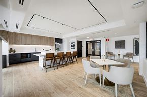 Nashville apartment for rent - A modern kitchen with a dining table and chairs.