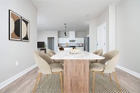 Cranberry Township apartment for rent - A modern dining room with a large table and chairs.