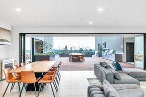Pasadena apartment for rent - A modern dining room with a long table and chairs.