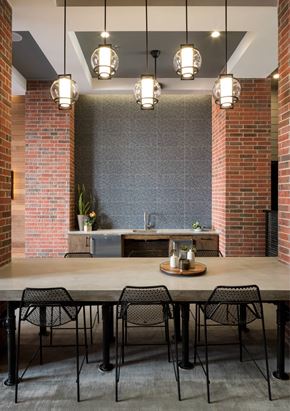 Frisco apartment for rent - An outdoor dining area with a table and chairs.