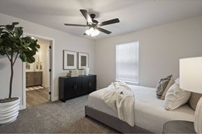 Oak Grove apartment for rent - Oak Grove, MO Apartments Near Valley Speedway - Rustic Heights - Image, Ceiling fan, neutral white walls, and plush carpet.