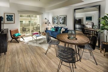 Glendale apartment for rent - A modern living room with a round table and chairs.