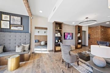 Mansfield apartment for rent - A living room with a grey sofa and a wooden coffee table.