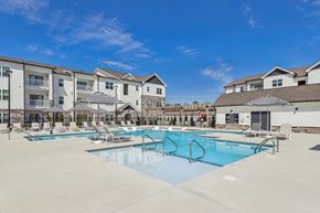 Nashville apartment for rent - our apartments offer a swimming pool with chairs and umbrellas
