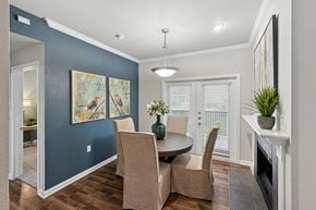 Dallas apartment for rent - A dining room with a table and chairs.