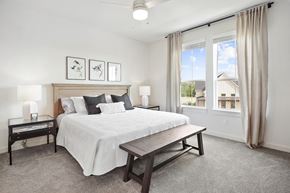 San Antonio apartment for rent - a bedroom with a large bed and two windows