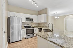 Atlanta apartment for rent - A kitchen with a granite counter top and stainless steel appliances.