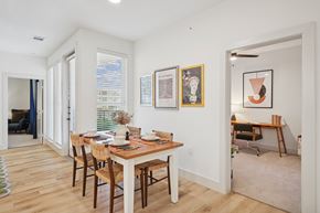 Lewisville apartment for rent - A dining room with a table and chairs.