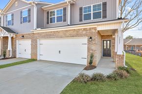 Huntsville apartment for rent - A house with a grey roof and a white garage door.