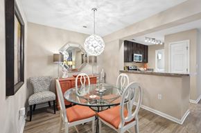 Chapel Hill apartment for rent - A dining room with a glass table and chairs.