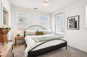 San Antonio apartment for rent - a bedroom with a bed and two windows