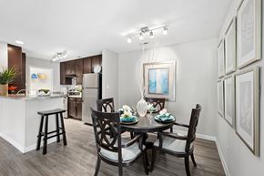 Cary apartment for rent - A dining room with a table set for four.