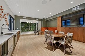 Nashville apartment for rent - A modern kitchen with a dining table and chairs.