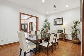 San Antonio apartment for rent - a dining room with a wooden table and chairs