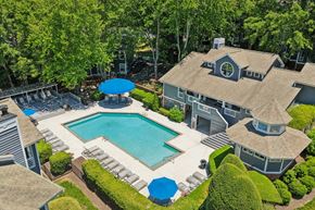 Winston Salem apartment for rent - A large house with a pool in the backyard.