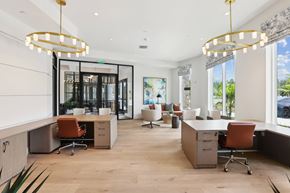 Wesley Chapel apartment for rent - a large office space with desks and chairs and large windows