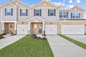Huntsville apartment for rent - A two-story house with a front yard and a garage.
