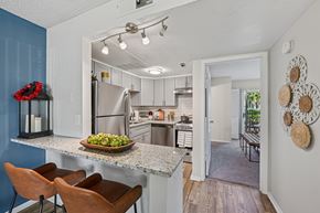 Palm Bay apartment for rent - A kitchen with a table and chairs.