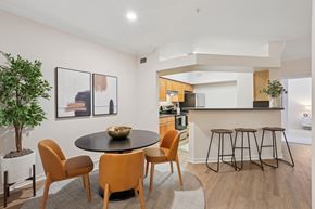 Raleigh apartment for rent - A modern dining room with a round table and chairs.