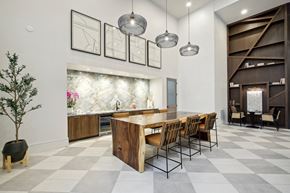 Acworth apartment for rent - a large dining room with a long wooden table and chairs
