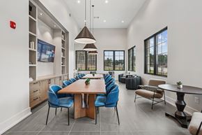 Suwanee apartment for rent - A modern dining room with a large table and chairs.