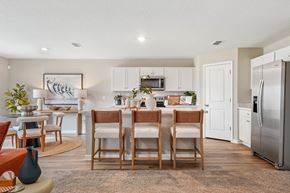 Jacksonville apartment for rent - A kitchen with a dining table and chairs.