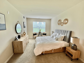 South Amboy apartment for rent - Garden-Style Apartments Near Cheesequake State Park, Sayreville, NJ - Morgan's Bluff - A Bedroom with Full-Size Bed w/ Headboard, and Nightstand w/ Lamp.