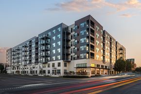 Middleton apartment for rent - A modern apartment building with a street in front of it.