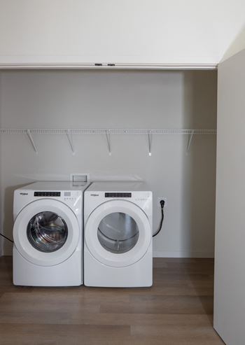 A washer and dryer in a laundry room 