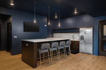 Kitchen with a bar