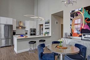 Minneapolis apartment for rent - a kitchen and dining room with a table and chairs